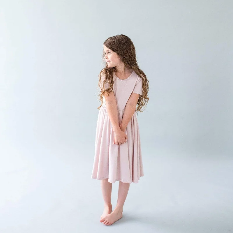 Mini dresses with bow back detail for a cute touch -Twirl Dress in Blush