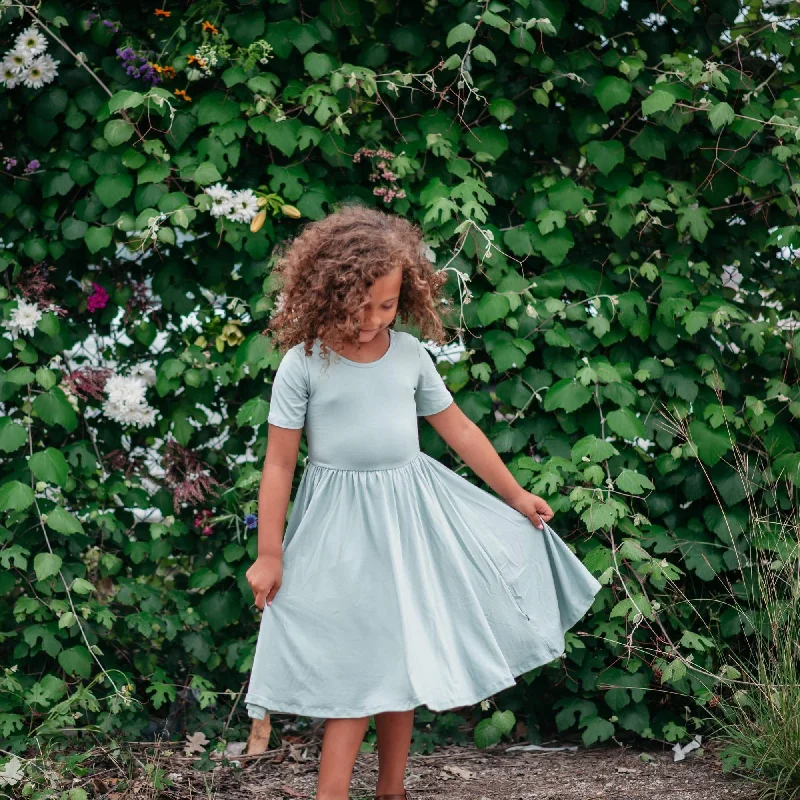 Mini dresses with asymmetrical neckline for a unique design -Twirl Dress in Sage