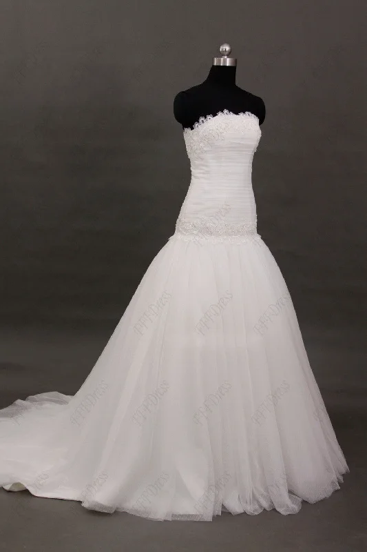 Flare dresses with eyelet lace for a feminine appeal -Strapless fit and flare wedding dresses Flare dresses with eyelet lace for a feminine appeal -Strapless fit and flare wedding dresses