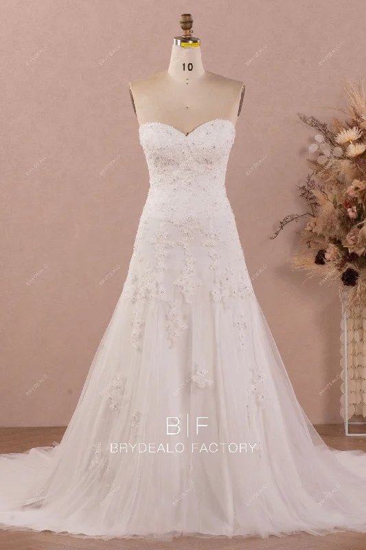 Flare dresses with fringe details for a western-inspired look -Strapless Sweetheart Beaded Lace Fit and Flare Garden Wedding Dress Flare dresses with fringe details for a western-inspired look -Strapless Sweetheart Beaded Lace Fit and Flare Garden Wedding Dress