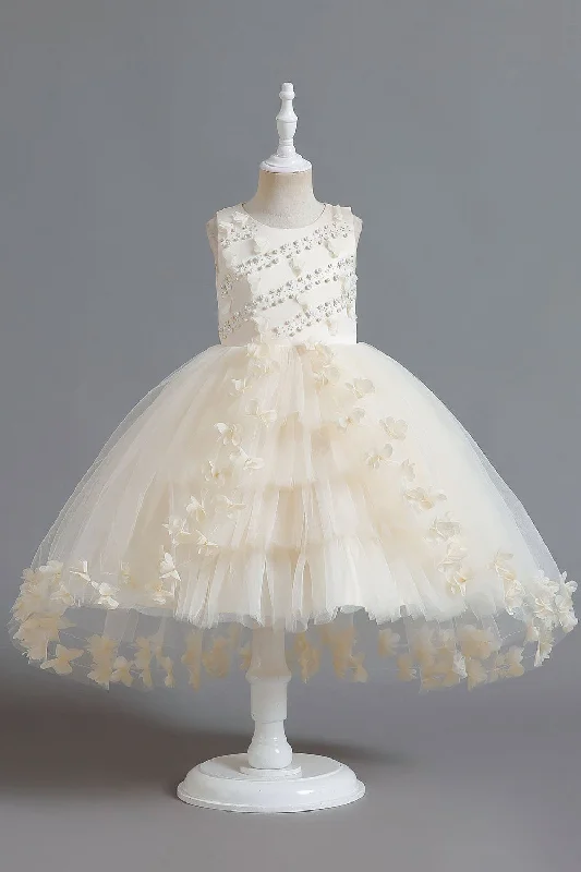 Flare dresses with side slits for added movement -Perles de Champagne Haut Bas Papillon Robes Filles Flare dresses with side slits for added movement -Perles de Champagne Haut Bas Papillon Robes Filles