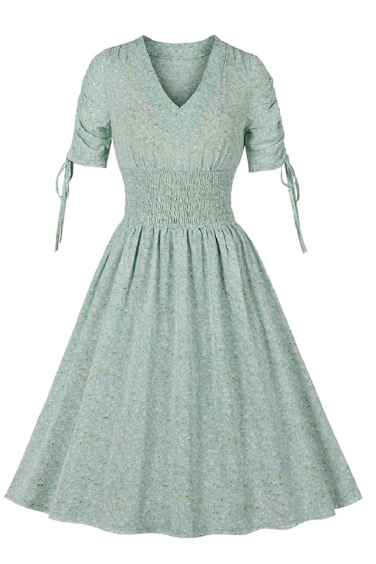 Flare dresses with cuffed sleeves for a tailored look -Robe vintage d’été imprimée verte