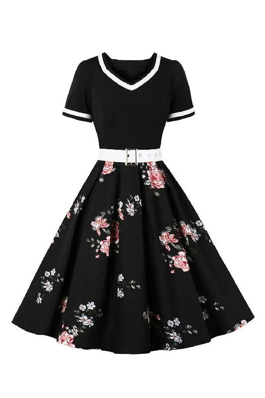 Flare dresses with polka dot patterns for a playful vibe -V col manches courtes noir 1950s robe avec ceinture Flare dresses with polka dot patterns for a playful vibe -V col manches courtes noir 1950s robe avec ceinture